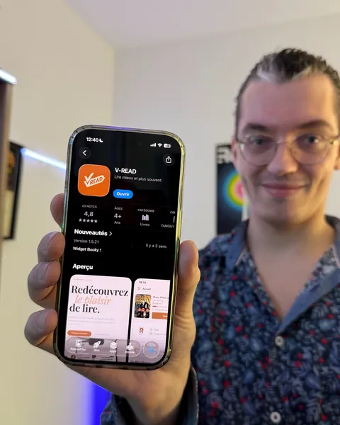 Virgile tient l’app Vread sur l’App Store